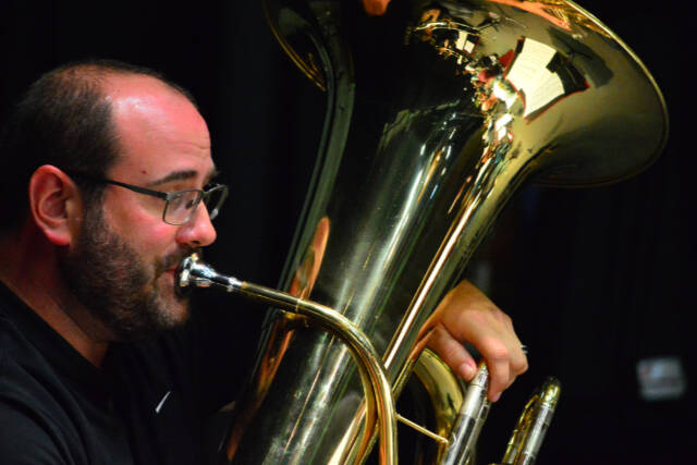 Tuba player Tyler Benedict is among the Port Angeles Symphony brass players prominent in "Fanfare for the Common Man." Aaron Copland's piece is part of the Family Pops concerts Friday and Saturday. (Diane Urbani de la Paz)
