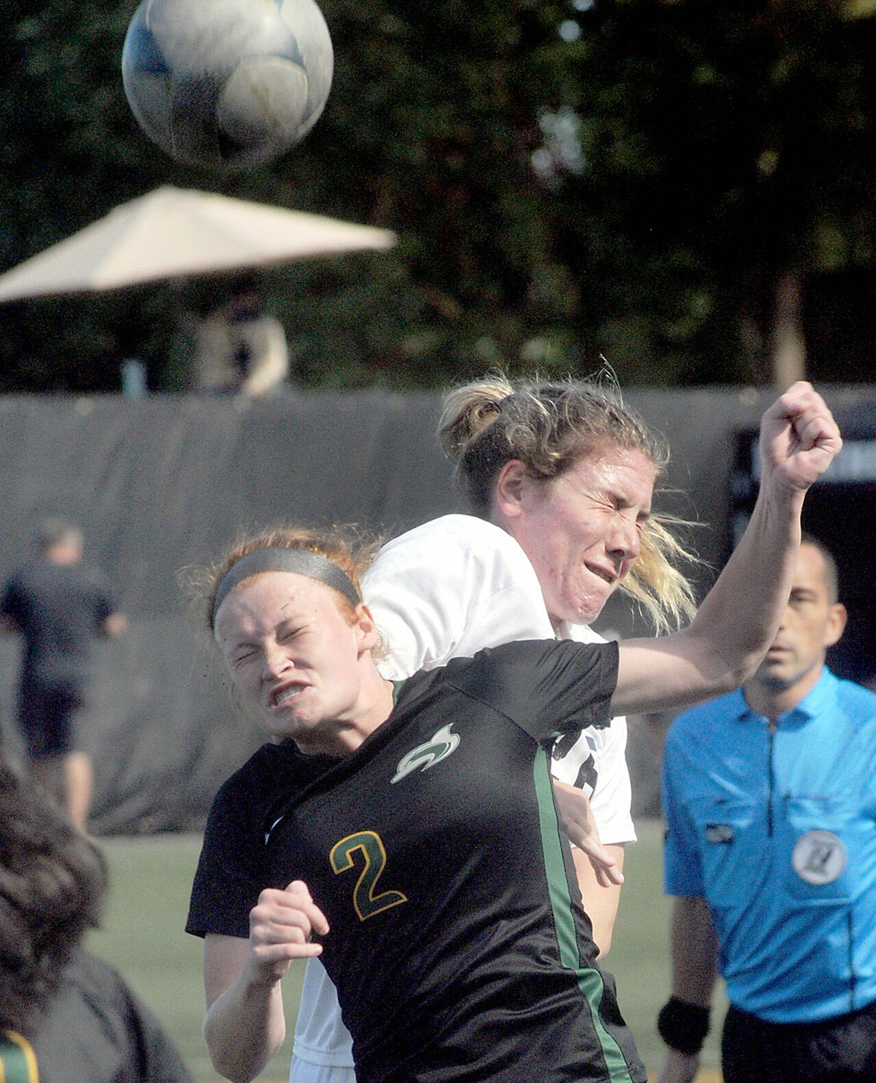 KEITH THORPE/PENINSULA DAILY NEWS Peninsula’s Kenzie Banner, rear, and Shoreline’s Kailey Brecke fight for a header during Saturday’s match in Port Angeles.