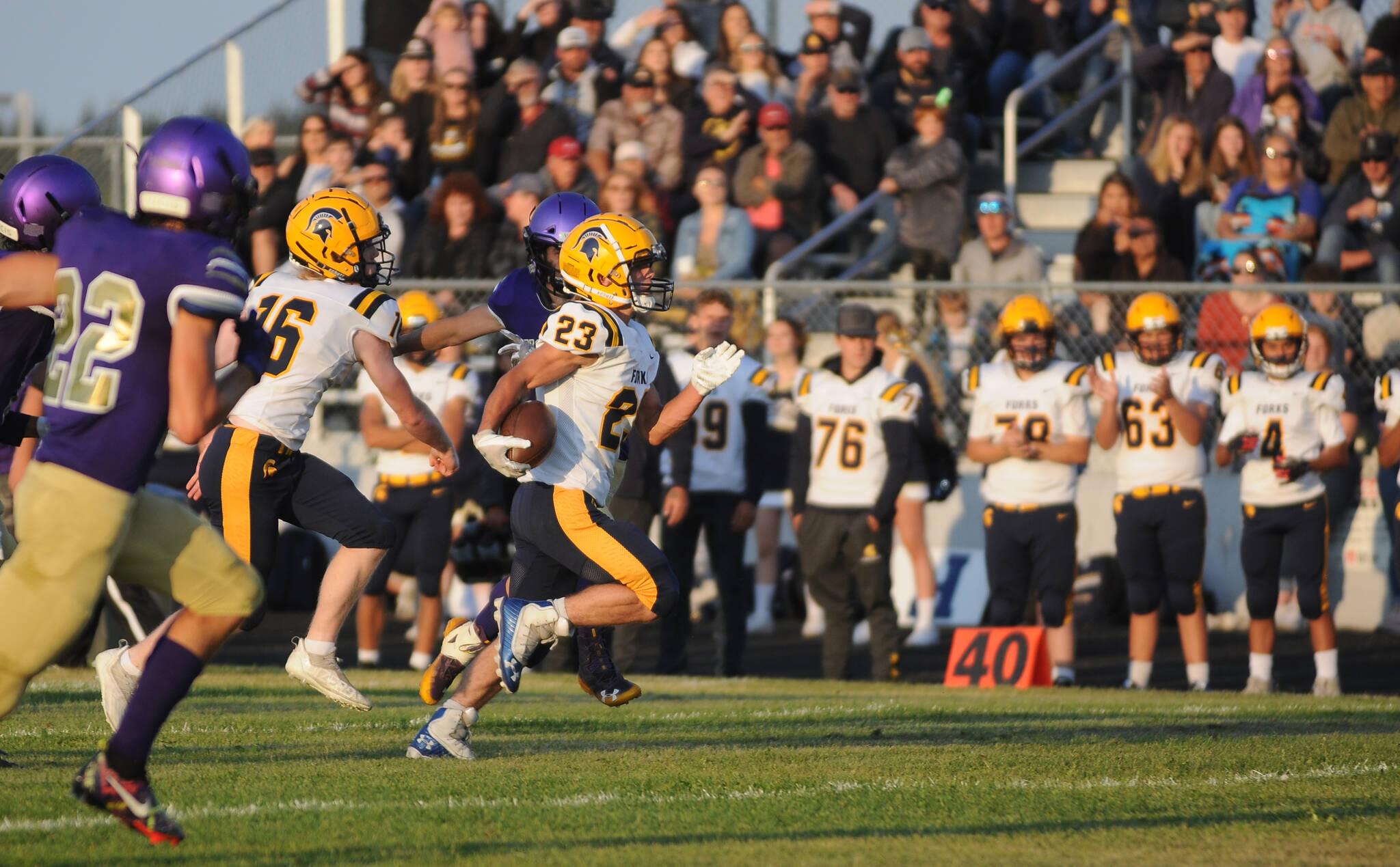 Forks’ Walker Wheeler busts loose for a long touchdown run against Sequim during the season opener for both squads. (Michael Dashiell/Olympic Peninsula News Group)
