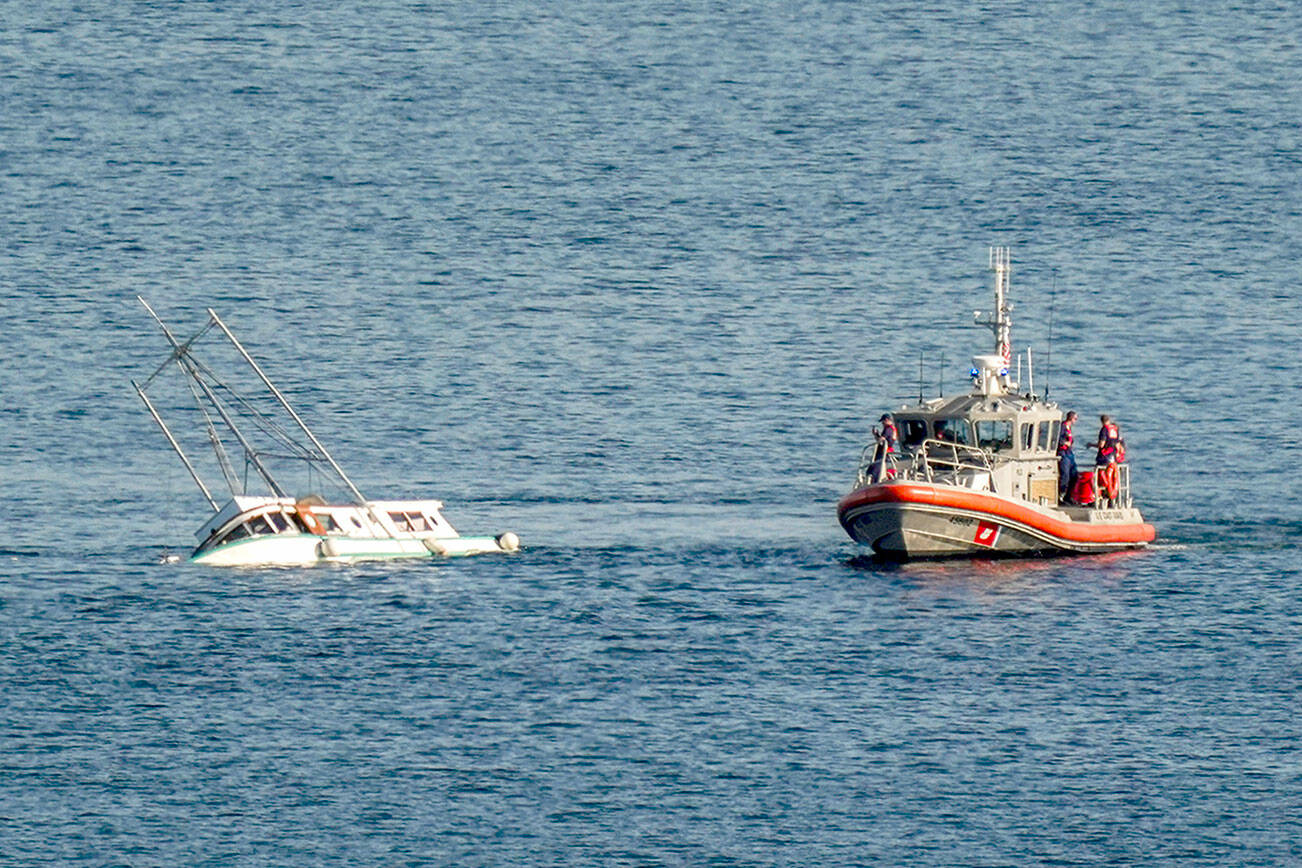 The U.S. Coast Guard and East Jefferson Fire and Rescue assisted a fishing trawler that began taking on water shortly after 3:30 p.m. Thursday in Port Townsend Bay. No more information was available Thursday afternoon. (Steve Mullensky/for Peninsula Daily News)