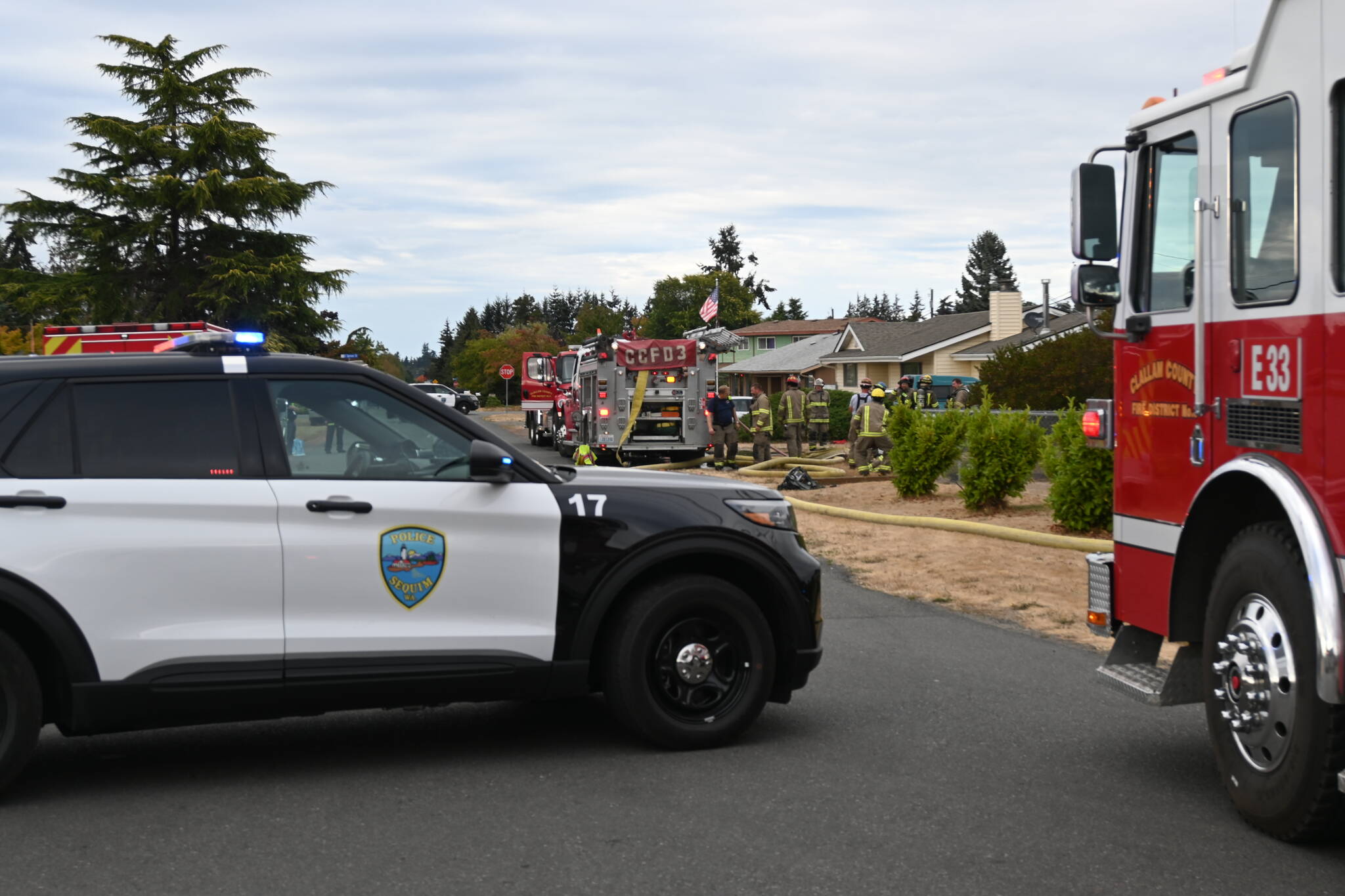 Michael Dashiell/Olympic Peninsual News Group
Firefighters from Clallam County Fire District 3 respond to a house fire on the 200 block of North Dunlap Avenue.