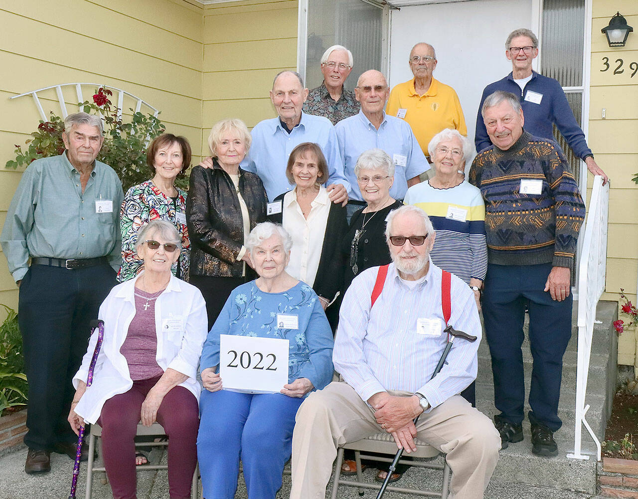 Front row, from left: Merle Bailey, Gwen Fairchild Potterfield and John Rife. Second row: Dick Hopkins, Carol Macklin Moffat, Marilyn Halberg Hill, Lois Grady Edwards, Grey Tozier Pohl, Pat Dotson Stamateou and Mel Kobel. Third row: Don Walken and Fred Sullivan. Top row: Dick McLean, Scooter Chapman and Ire Beadle.