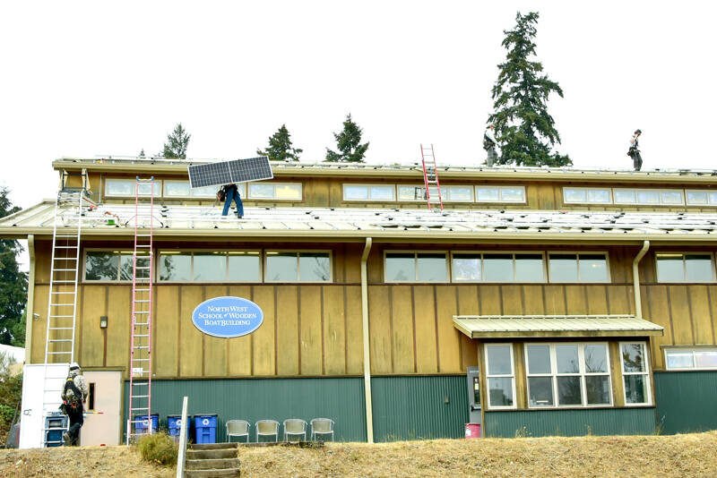 An array of 164 solar panels have been installed on roofs at the upper campus of the Northwest School of Wooden Boatbuilding. (Elizabeth Becker)