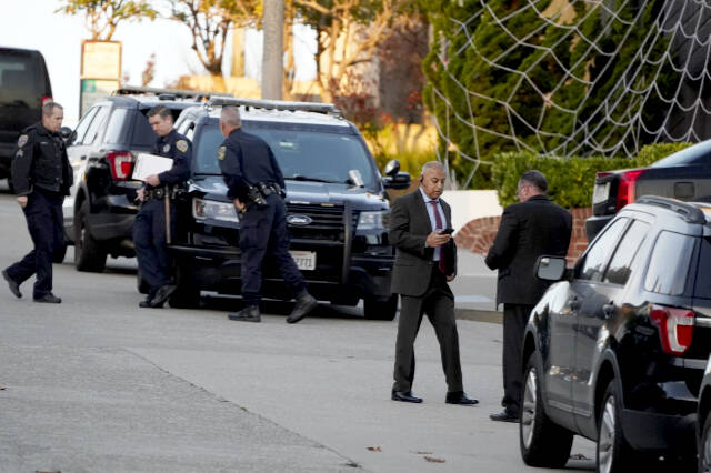 Police investigators work outside the home of Paul Pelosi, the husband of House Speaker Nancy Pelosi, in San Francisco, Friday, Oct. 28, 2022. Paul Pelosi, was attacked and severely beaten by an assailant with a hammer who broke into their San Francisco home early Friday, according to people familiar with the investigation. (AP Photo/Eric Risberg)