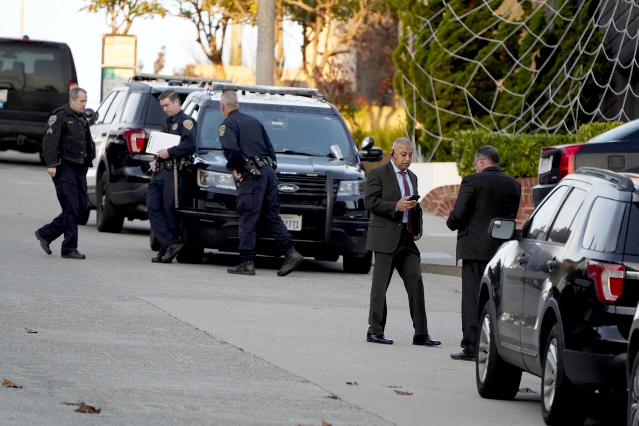 Police investigators work outside the home of Paul Pelosi, the husband of House Speaker Nancy Pelosi, in San Francisco, Friday. Paul Pelosi, was attacked and severely beaten by an assailant with a hammer who broke into their San Francisco home early Friday, according to people familiar with the investigation. (AP Photo/Eric Risberg)