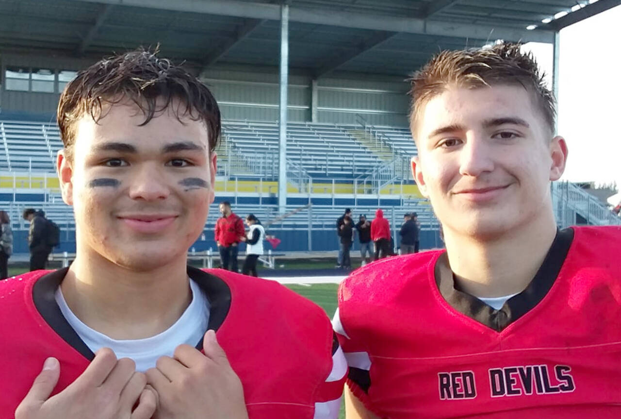 Jodell Wimberley, left, and Julian Carrick, Neah Bay football