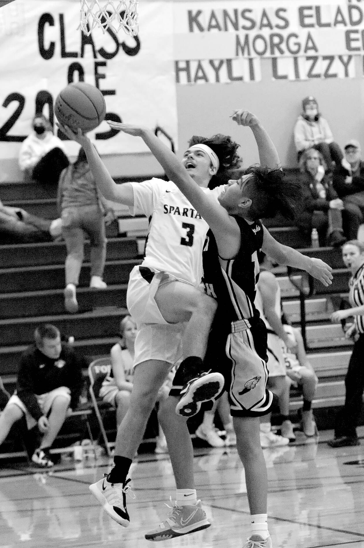 Lonnie Archibald/for Peninsula Daily News
Forks’ Landin Davis attempts a layup during a game against North Beach last season. Davis is set to start for the Spartans this season.