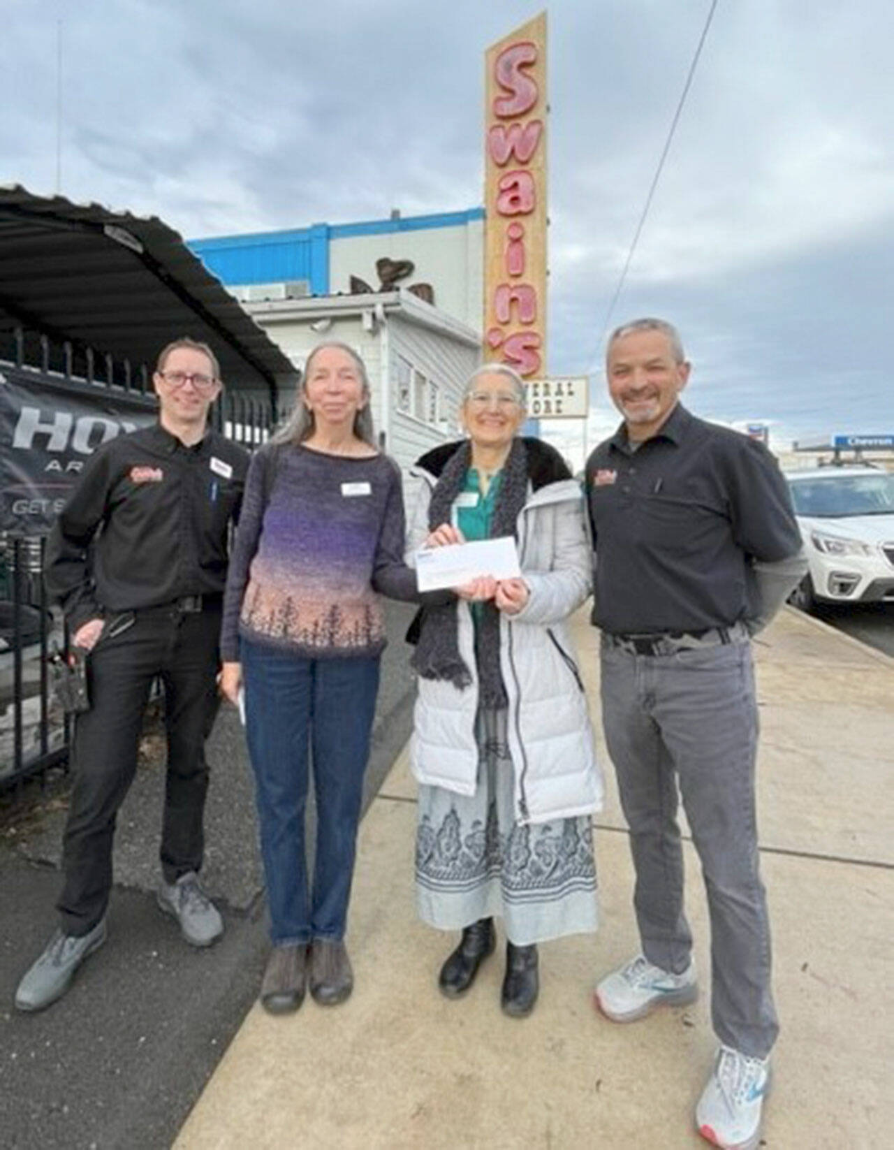 Pictured, from left to right, are Don Droz, Marca Davies, Astrid Raffinpeyloz and Mike Mudd. 
--