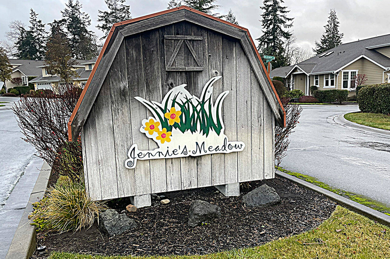 Matthew Nash/ Olympic Peninsula News Group
A man inside Jennie’s Meadow helped his neighbor evade a car fire that spread from underneath to engulf the entire car and burn the asphalt.