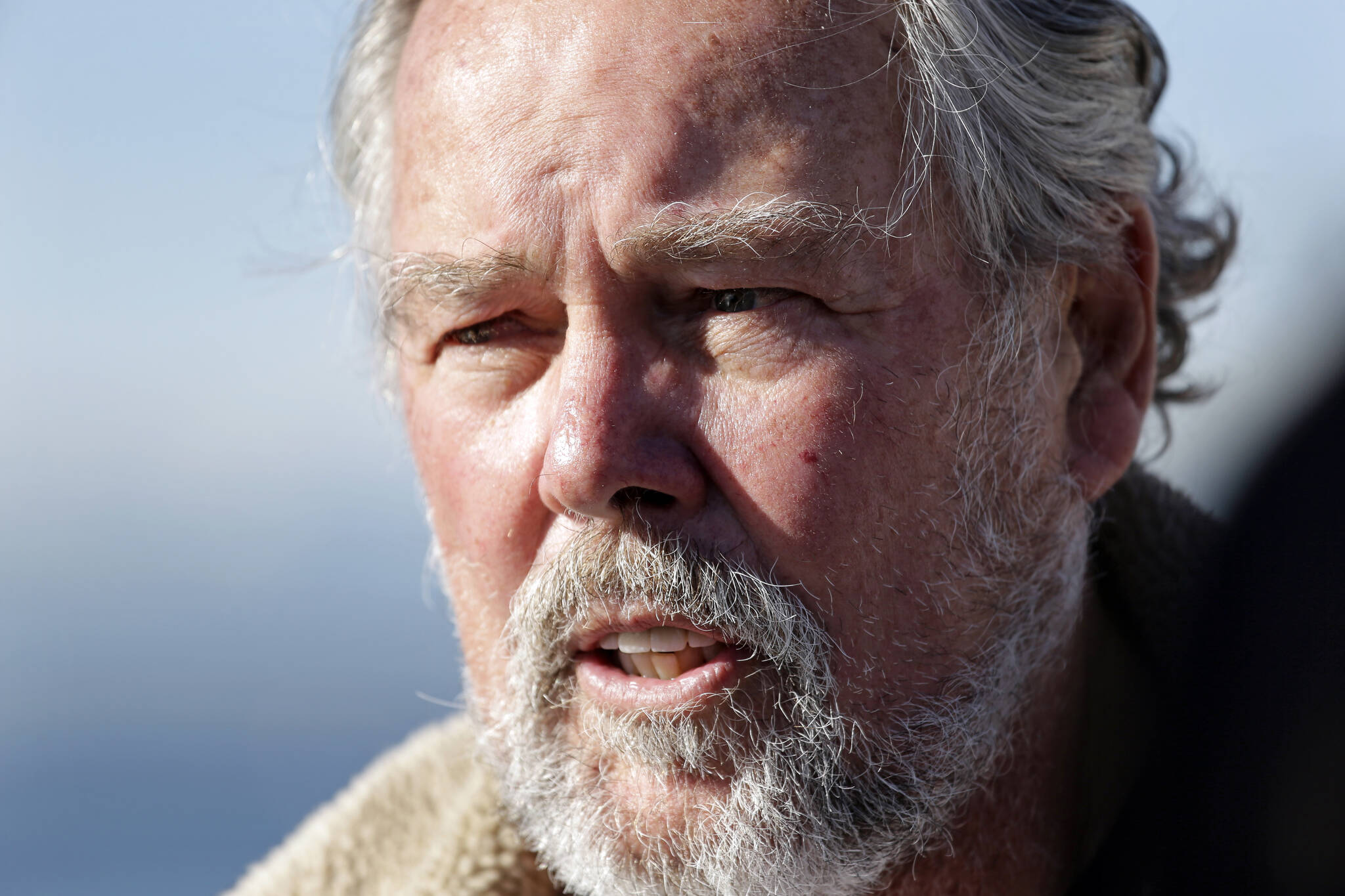 Ken Balcomb, senior scientist at the Center for Whale Research (CWR), talks about the declining population of endangered orcas that frequent Washington state waters during a news conference on Oct. 28, 2016, in Seattle. Balcomb, a pioneering whale researcher who devoted the past five decades to studying the Pacific Northwest’s charismatic and endangered orcas, died Thursday, Dec. 15, 2022, according to the organization he founded. He was 82. (Elaine Thompson/The Associated Press)