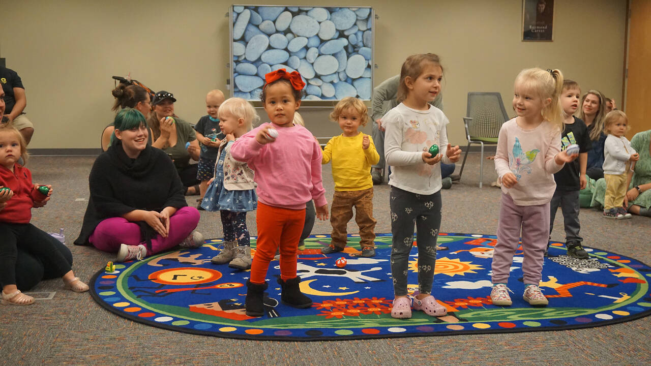 Children particpate in a library activity. (North Olympic Library System)