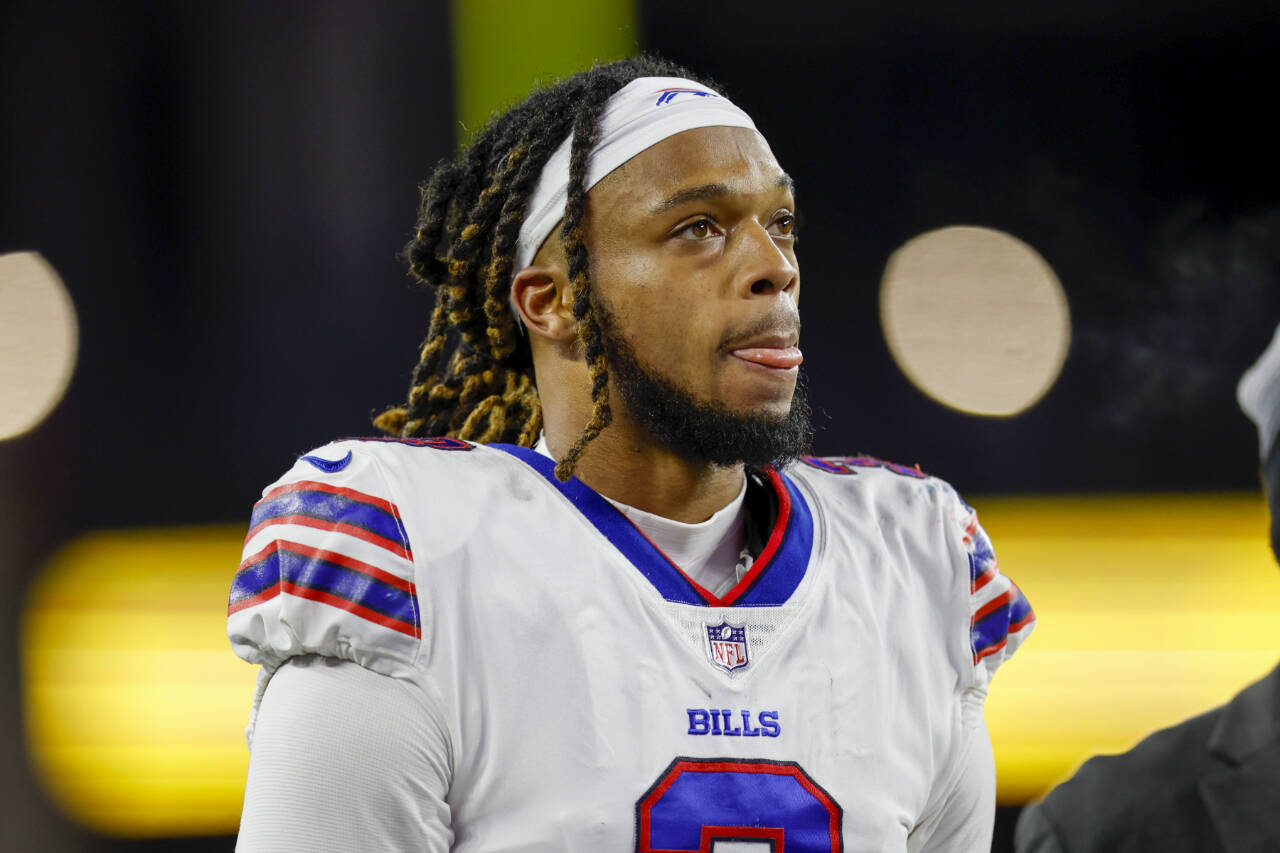 Buffalo Bills safety Damar Hamlin (3) reacts during the second half of an NFL football game against the New England Patriots, Thursday, Dec. 1, 2022, in Foxborough, Mass. (AP Photo/Greg M. Cooper)
