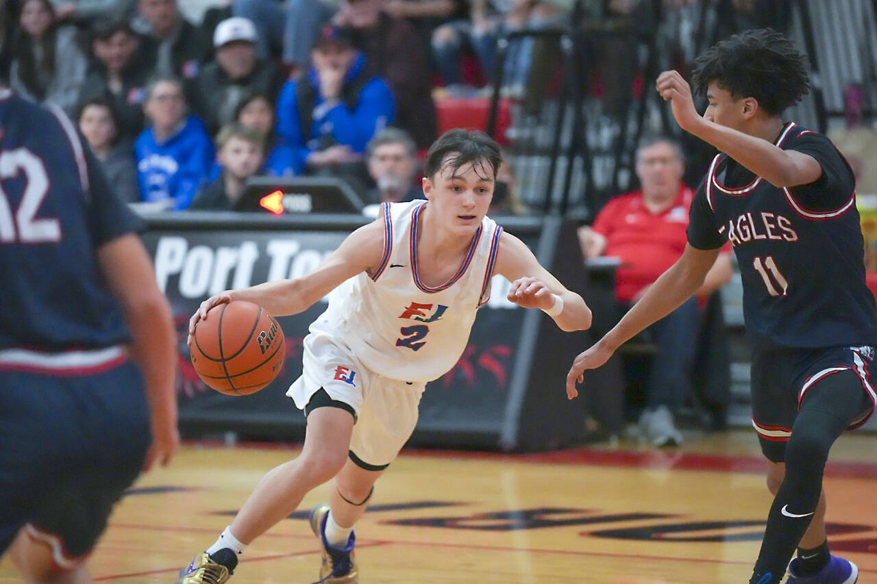 East Jefferson’s Brody Moore drives against the Life Christian defense Monday in Port Townsend. Moore finished the game with 13 points. (Steve Mullensky/for Peninsula Daily News)
