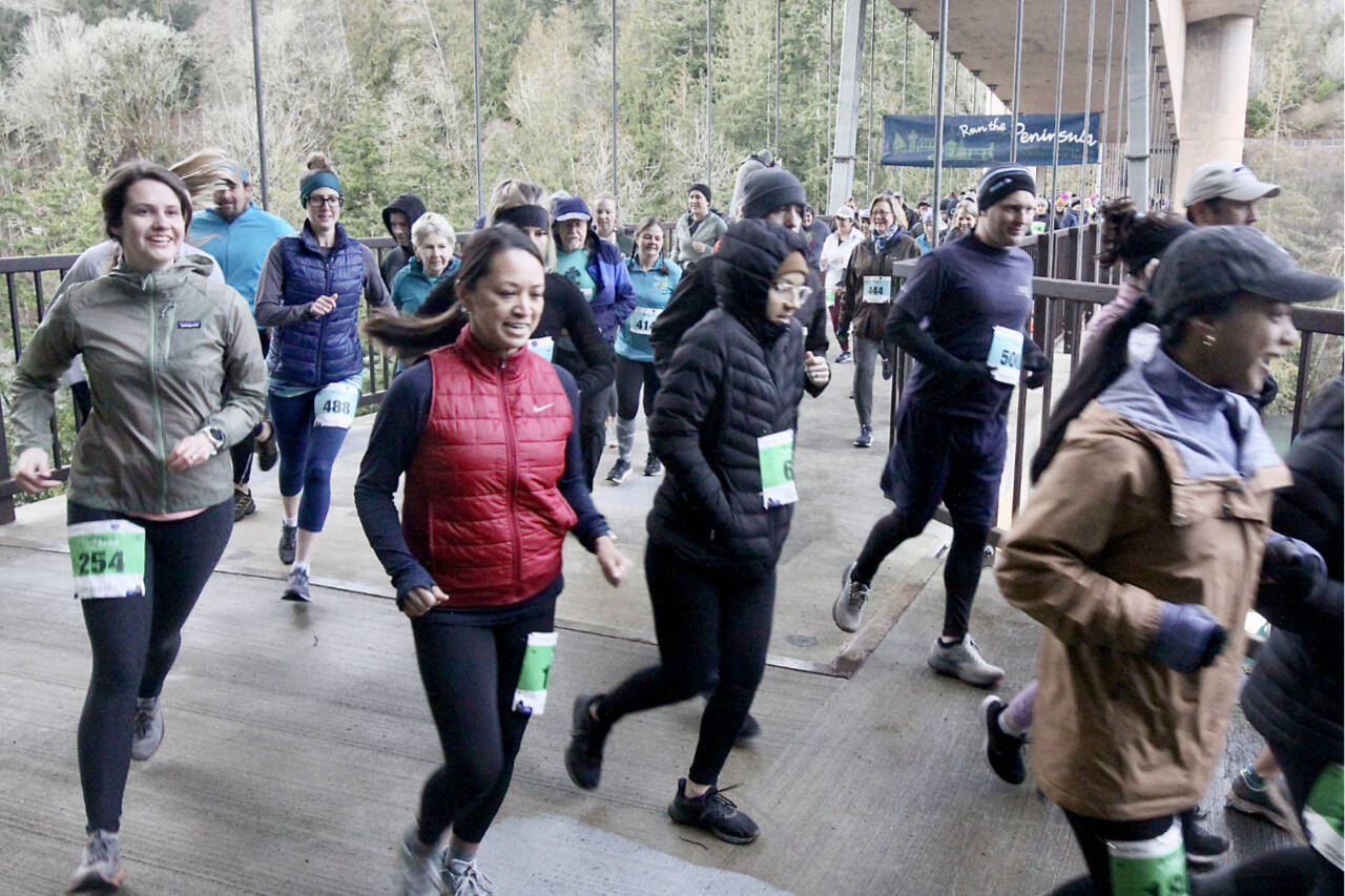 Runners take off at the fifth annual Elwha Bridge Run on Saturday morning just west of Port Angeles. More than 340 runners participated in the first race of the Run the Peninsula series. (Dave Logan/for Peninsula Daily News)