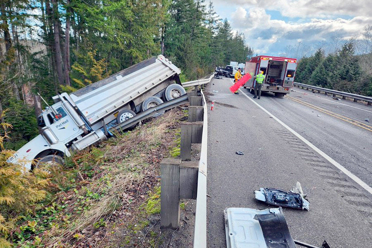 A dump truck was sent over the embankment on state Highway 104 near state Highway 19 when two pickups were involved in a glancing head-on collision shortly before 11 a.m. 
Jefferson County Sheriff's Office