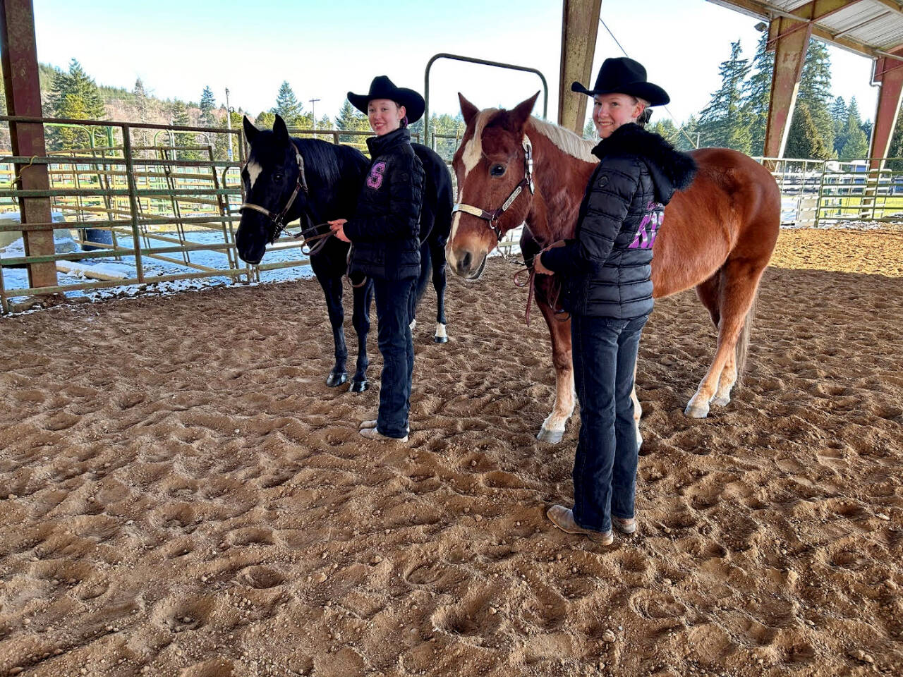Sequim Equestrian Team won 1st place in 10 events at its second of three Washington High School Equestrian Team meets, held Feb. 24-26, at Grays Harbor Fairgrounds indoor area. Competing with borrowed horses in Showmanship were Katelynn Sharp, left, with Nikki (coach Keri’s horse) and Celbie Karjalainen with Pistol.Sequim Equestrian Team won 1st place in 10 events at its second of three Washington High School Equestrian Team meets, held Feb. 24-26, at Grays Harbor Fairgrounds indoor area. Competing with borrowed horses in Showmanship were Katelynn Sharp, left, with Nikki (coach Keri’s horse) and Celbie Karjalainen with Pistol (Coach Katie’s horse). (Photo courtesy of KATIE SALMON-NEWTON)
