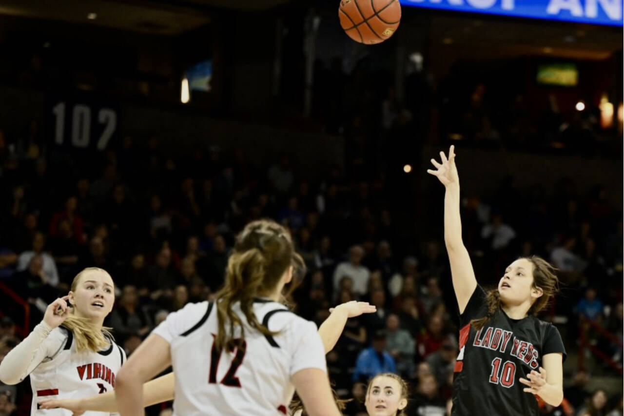 Neah Bay's Allie Greene shoots a floater over the Mossyrock defense Saturday night in Spokane. Greene finished with 19 points, leading all scorers, in the 56-54 Neah Bay win.
(Bridget Mayfield/for the Peninsula Daily News)