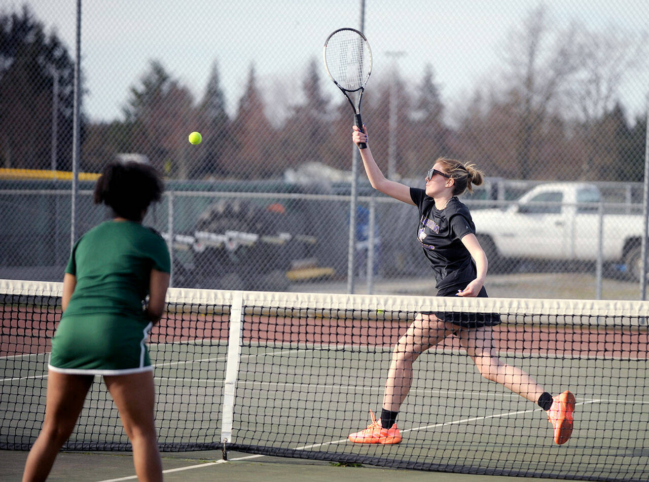 Michael Dashiell/Olympic Peninsula News Group Sequim’s Payton Smithson returns a shot during her No. 2 doubles match with Port Angeles on Wednesday at Sequim. Smithson and Amalia Gonzalez teamed to beat Kayla Jones and Bridget Weed 6-3, 6-1.