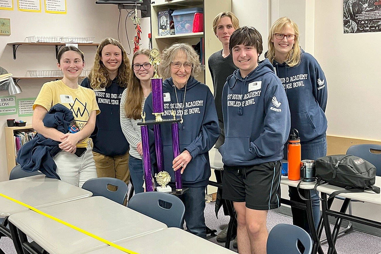 Pictured, from left to right, are Lucy Schmitt, Zia Magill, Mia Lowell, Coach Susan Trower, Noah Holly, Andrew Corbo and Nadia Fisch.