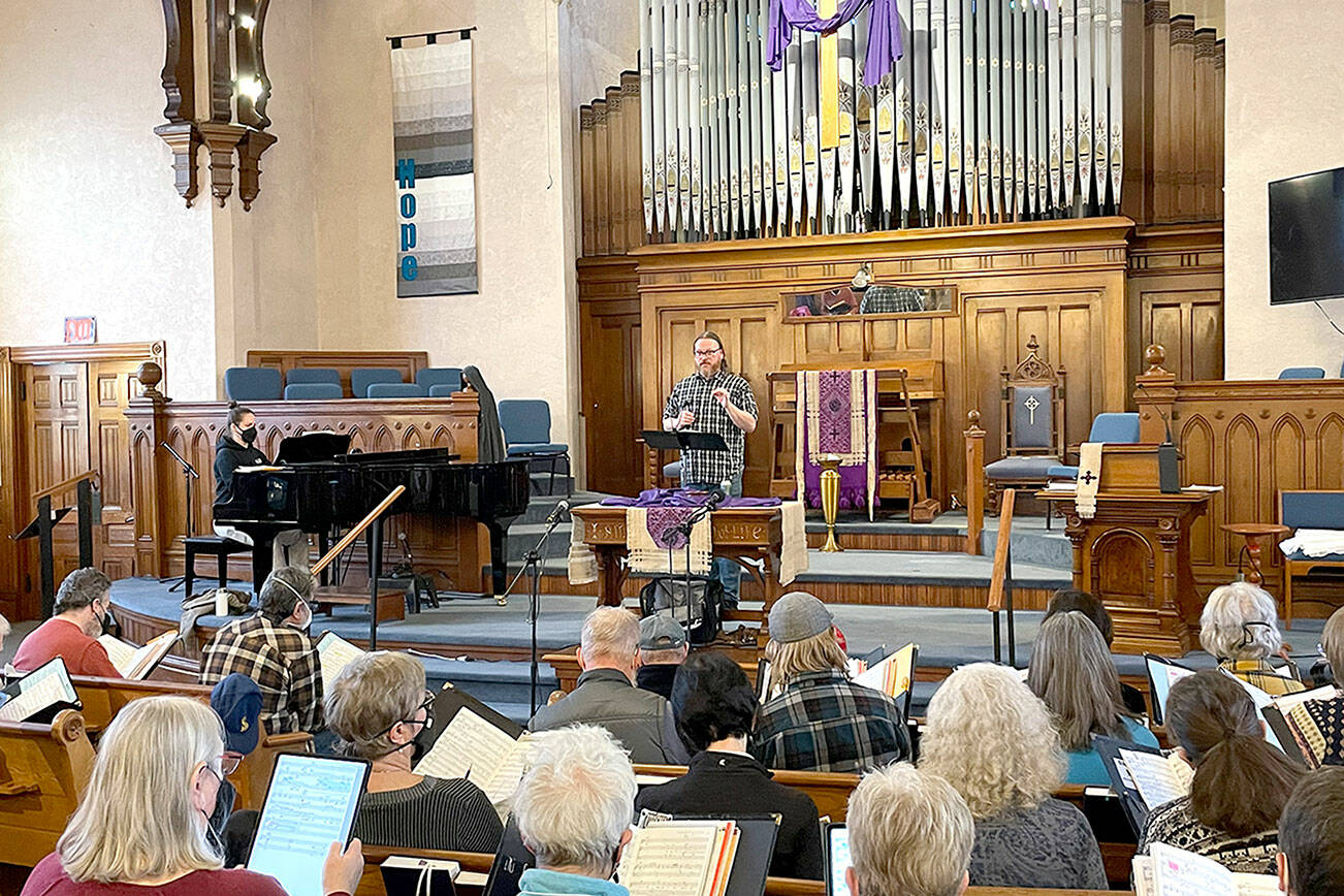 Spring director Jonathan Stafford rehearses the choir in preparation for spring Broadway concerts this weekend.