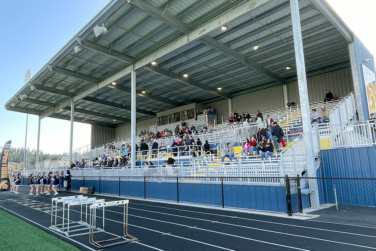 Quillayute Valley School District’s new Spartan Stadium was officially opened with a grand opening ceremony that honored the school board, building committee members and long-serving volunteers. (Paula Hunt/Peninsula Daily News)