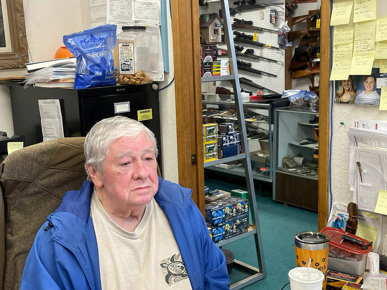 Gun store owner Jim Rogers expects to weather an impending ban on assault weapon sales. (Paul Gottlieb/for Peninsula Daily News)