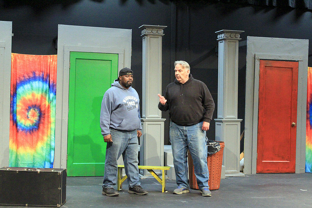 At a recent practice, Francis Henshall (right), played by Mark Valentine, explains the benefits of a Pub that serves food to Stanley Stubbers (left), played by Fred Robinson.