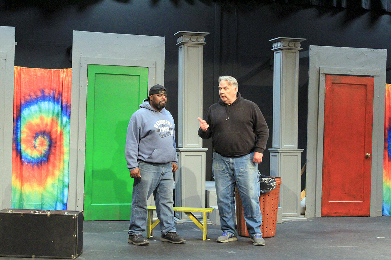 At a recent rehearsal, Francis Henshall (right), played by Mark Valentine, explains the benefits of a Pub that serves food to Stanley Stubbers (left), played by Fred Robinson.