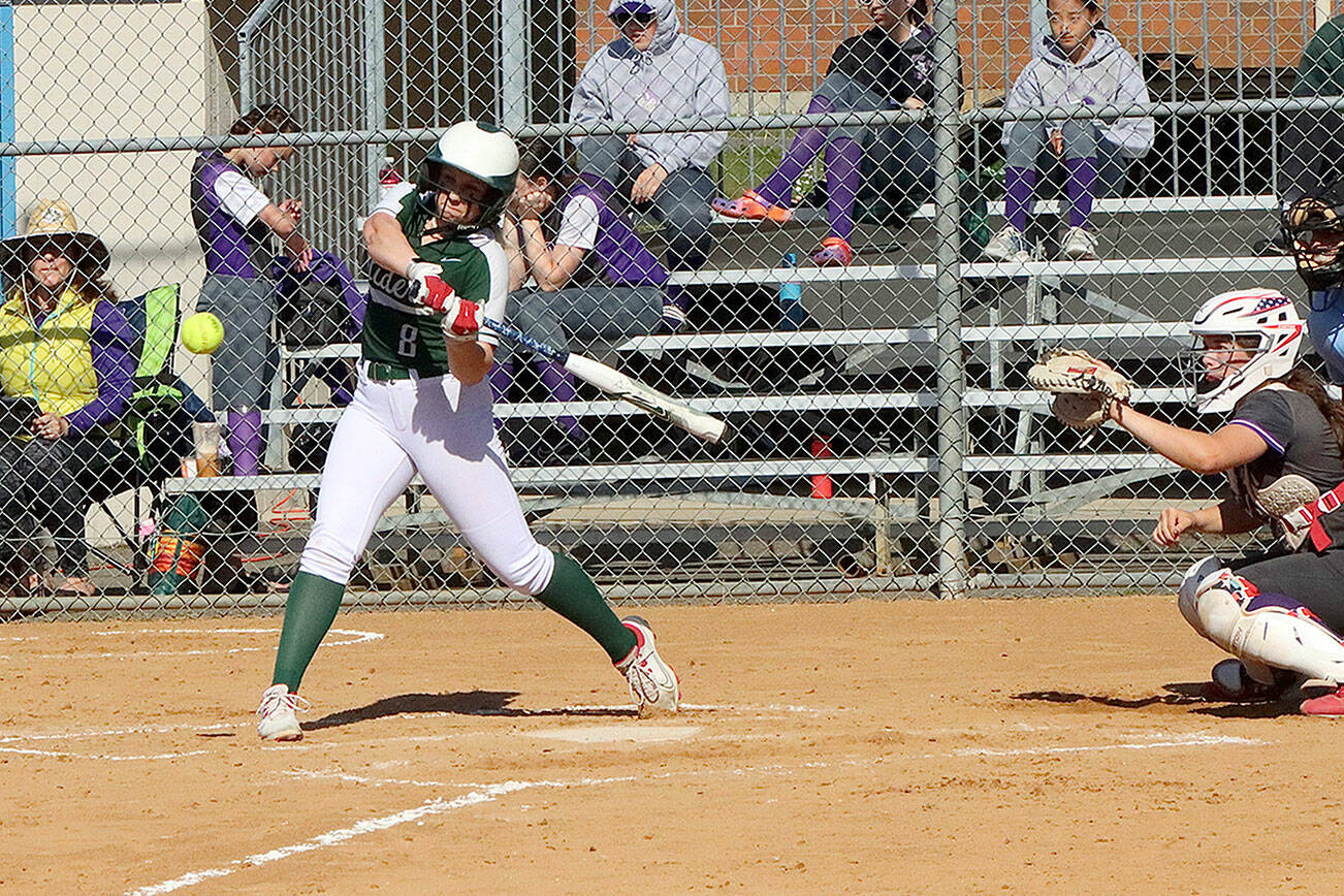 Dave Logan/for Peninsula Daily News
Port Angeles' Heidi Leitz connects on a solo home run during the Roughriders 7-5 loss to North Kitsap at Dry Creek Elementary on Thursday.