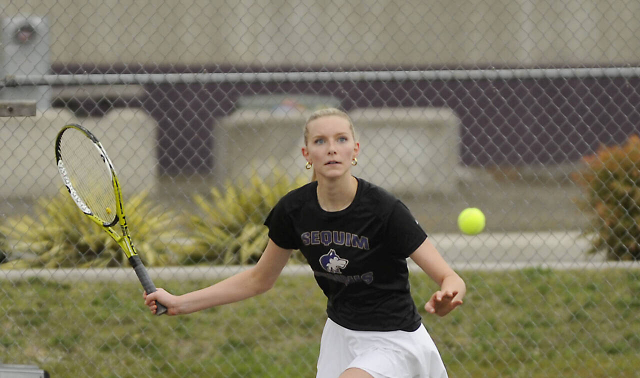 Sequim’s Kendall Hastings plays against an Olympic opponent on April 21 in Sequim. Hastings won three matches at the West Central 2/3 2A tournament this weekend and finished second in the district, moving on to the state tennis championships this weekend at the Nordstrom Tennis Center in Seattle. (Michael Dashiell/Olympic Peninsula News Group)