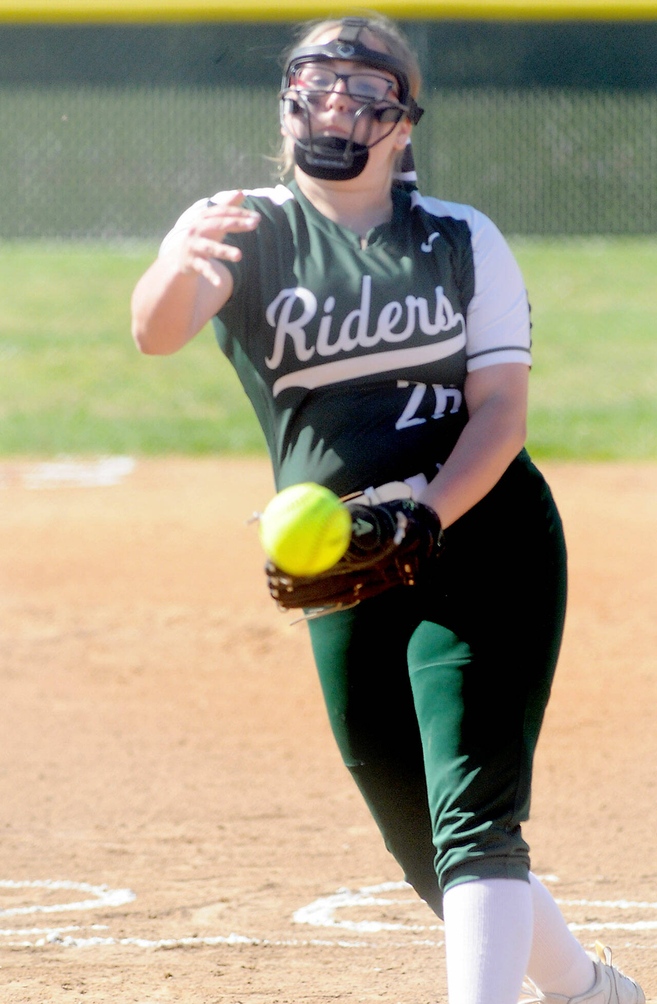 Port Angeles pitcher Cheyenne Zimmer throws in the first inning against Sequim on Friday afternoon in Port Angeles. (Keith Thorpe/Peninsula Daily News)