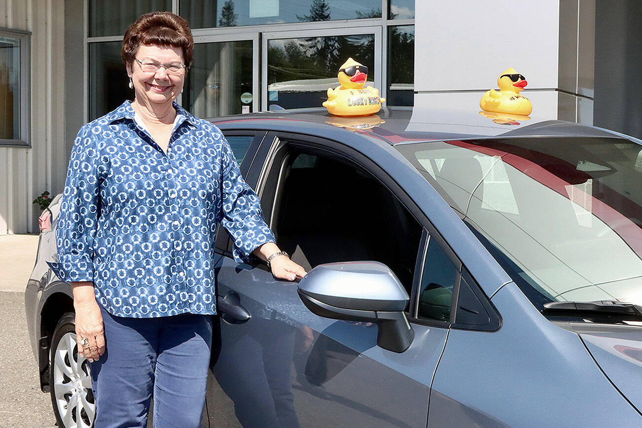 Dave Logan/for Peninsula Daily News 

Kay Hermann of Port Angeles poses with her 2023 Toyota Corolla from Wilder Toyota. She won the top prize in the Great American Duck Derby, which benefits the Olympic Medical Center Foundation. “It’s amazing. I couldn’t believe Bruce Skinner (the foundation executive director) when he called me. I thought he was joking.” Hermann has supported the foundation through the years, figuring she has purchased “a million ducks’” over the years. Her plans for the new car are perhaps for her grandson turning 16 soon.