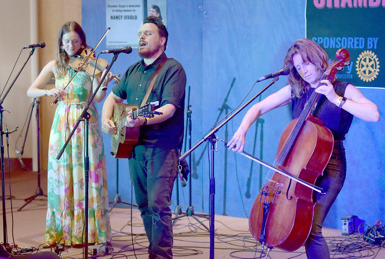 Sam Chase, center, performs with The Sam Chase Trio, Chandra Johnson, left, and Devon McClive, on Saturday at the Chamber Stage of the Juan de Fuca Festival. (Keith Thorpe/Peninsula Daily News)