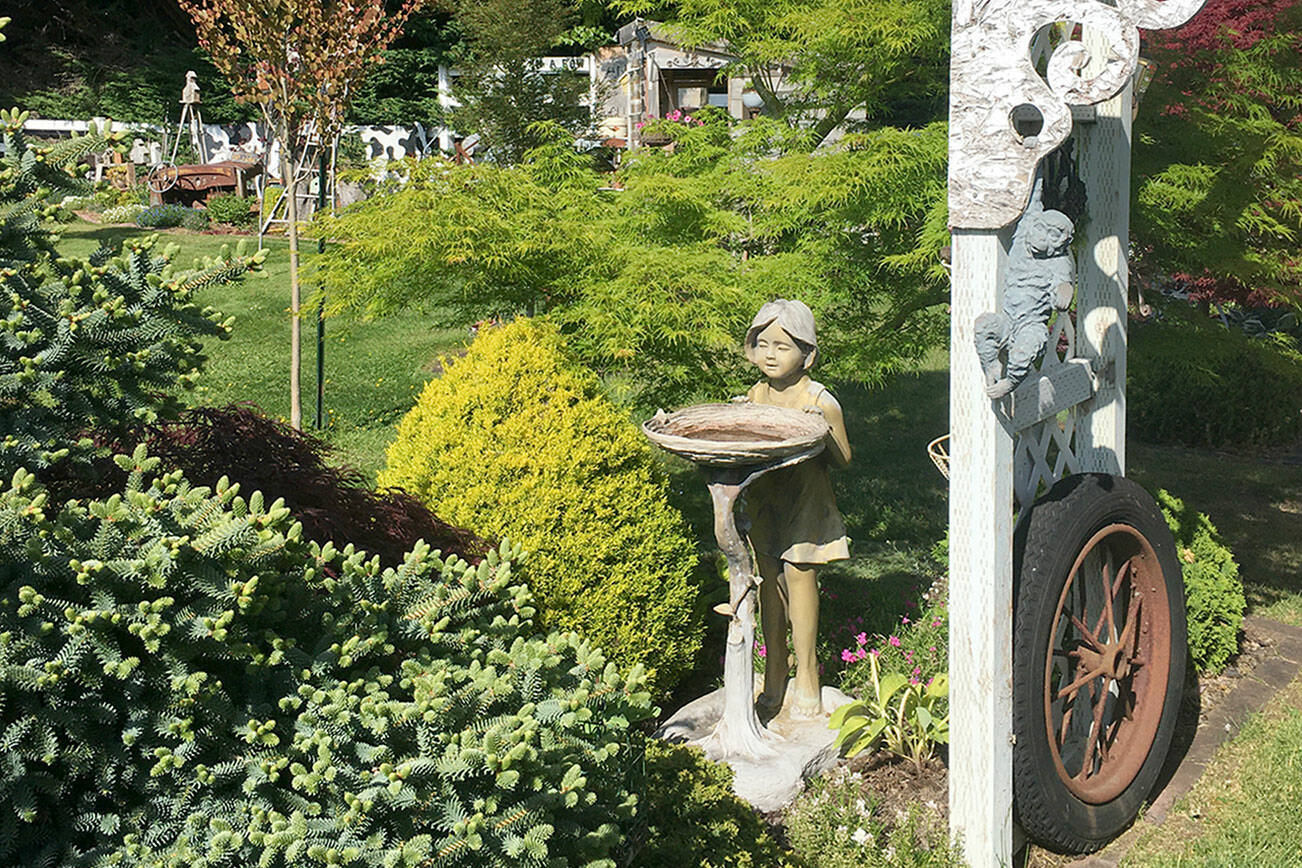 Cherie Higbee's garden, which has grown and changed since it was last on the Petals and Pathways tour in 2017,  features recycled treasures.