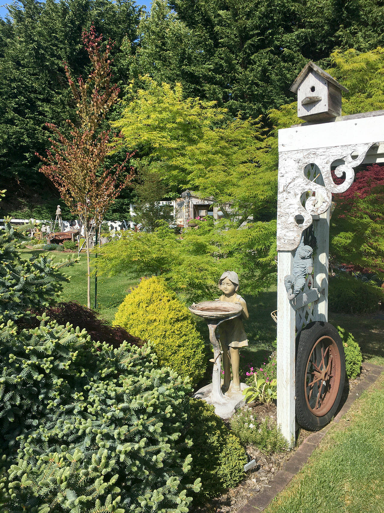 Cherie Higbee’s garden, which has grown and changed since it was last on the Petals and Pathways tour in 2017, features recycled treasures.