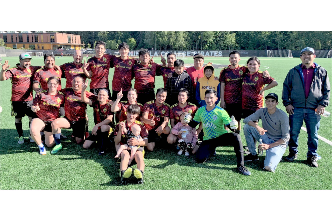 The Forks Football Club won the Peninsula Soccer League champion. In front is Hugo Sandoval II (holding Hugo Sandoval III). From left, second row, are Janessa Ramos, Julio Maroto, Hugo Sandoval I, Candida-Rose Sandoval, Gabriel Julio, Aurelio Garcia (holding Natalia Garcia) and German Camacho. From left, third row, are Costa Cendejas, Javier Julio, Jose Cendejas, Dani Jimenez, Jesus Gonzalez, Luis Perez, Sebastian Thomas Pedro, Carmelo Julio Jr., Carmelo Julio Sr., Brian Garcia, Ernesto Julio and Chenoa Black. Missing are Leslie Beltran are Miley Blanton. (Rick Ross photo)