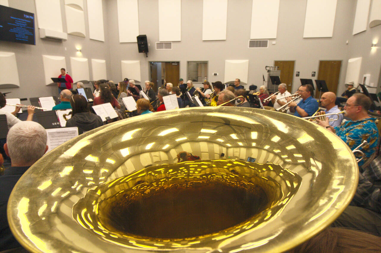 Members of the Sequim City Band rehearse in the new hall at the James Center for the Performing Arts in preparation for their May 7 concert. The band invites the community to celebrate the new rehearsal space and enjoy a free concert on Sunday. (Photo by Mark Wick/Sequim City Band)