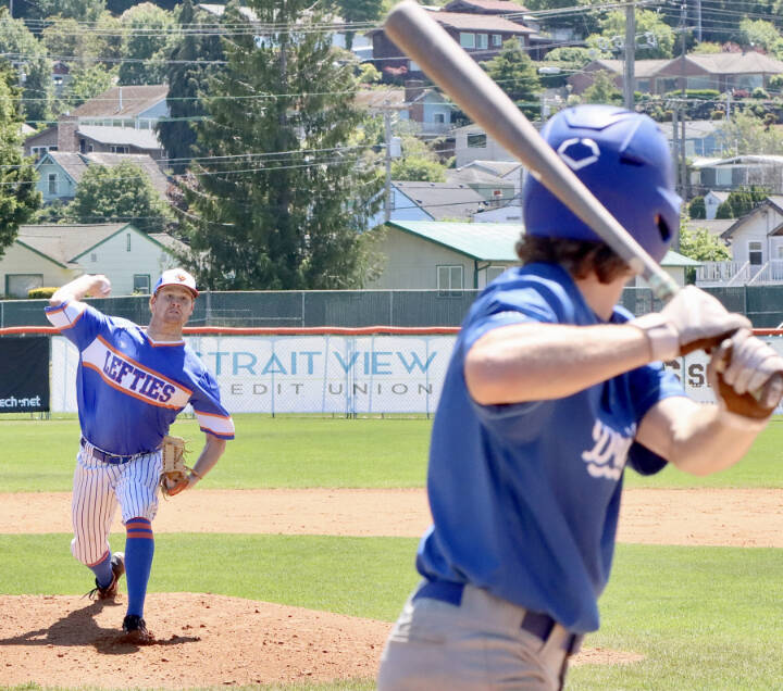 Lefties starter jack O’Brien throws to the plate in the first inning Sunday against Springfield. The Lefties rallied with a nine-run seventh inning to win the game 10-7. (Dave Logan/for Peninsula Daily News)