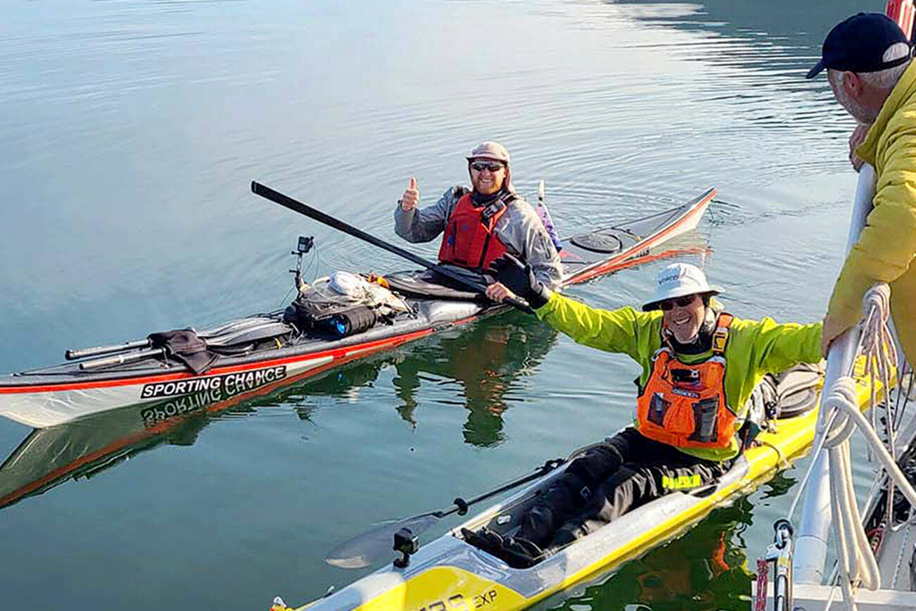 Scott MacDonald of Team Sporting Chance, left, and Stuart Sugden of Team Bella Bella and Beyond, seen near Fraser Reach, British Columbia, on Sunday, were the final two racers to complete the Race to Alaska on Tuesday. They were the 17th and 18th teams, respectively. (Northwest Maritime Center)
