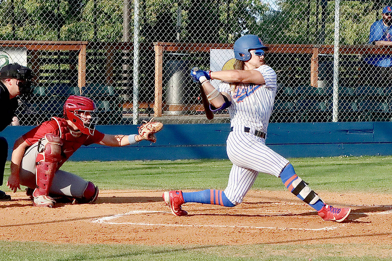 Dave Logan/for Peninsula Daily News
Port Angeles' Trent Jackson follows through on a single into right field during the Lefties' series-winning 3-2 victory over Wenatchee on Thursday at Civic Field.