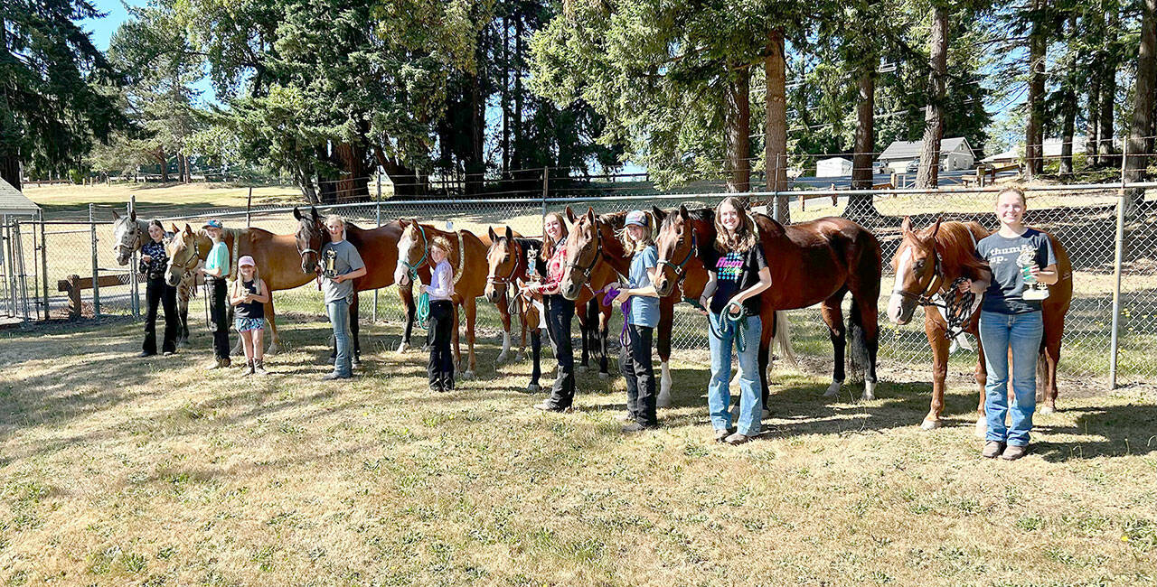 4-H High Point winners from a show earlier this month which qualifies riders to compete at the Clallam County Fair’s horse show Aug. 17-20. Left to right: Intermediate Champion Lila Tore;, Intermediate Reserve Champion Ellie Karjalainen; Helping Hands trophy Kinlee Morris; Walk Trot Champion Elise Sirguy; Walk Trot Reserve Champion Grace Karjalainen; Games Champion Katelynn Sharpe; Senior Reserve Champion tied between Celbie, Karjalainen and Ava Hairell; Senior Champion Taylor Maughan. Not pictured is Games Reserve Champion Zakara Braun. (Photo by Katie Newton)
