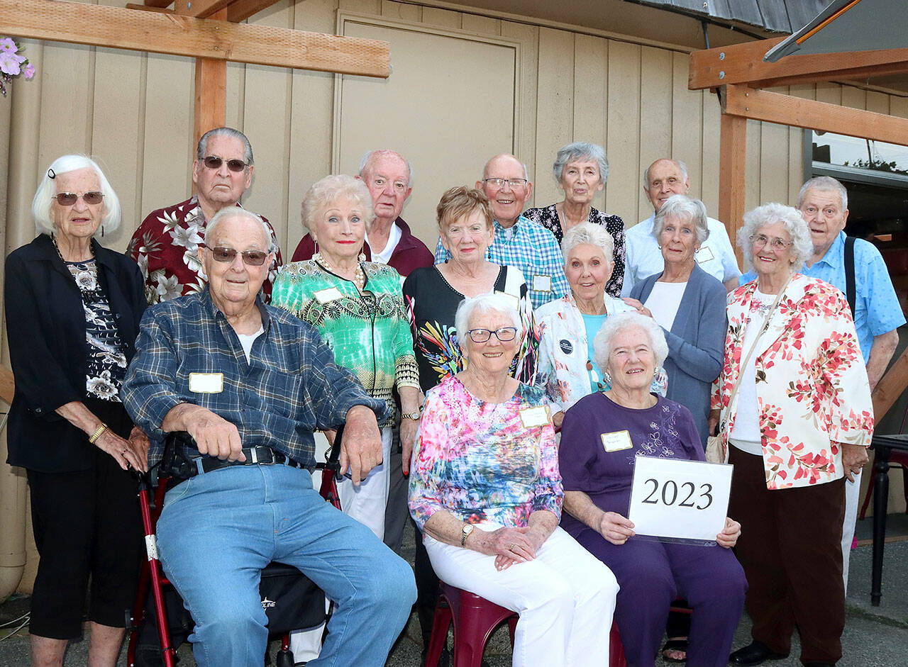 Back row, left to right: Joann Reyonlds, Howard Byers, Carl Fischer, Dick Kent, Jackie Partridge, Darold Davidson and Ralph Schmidt. Middle row: Frank Robinson, Mary Anderson, Daphne Eshom, Carol Donahue, Patricia Goodfellow and Shirley Williams. Front row: Marilyn Kraus and Loretta Chapman. (DAVE LOGAN/FOR PENINSULA DAILY NEWS)