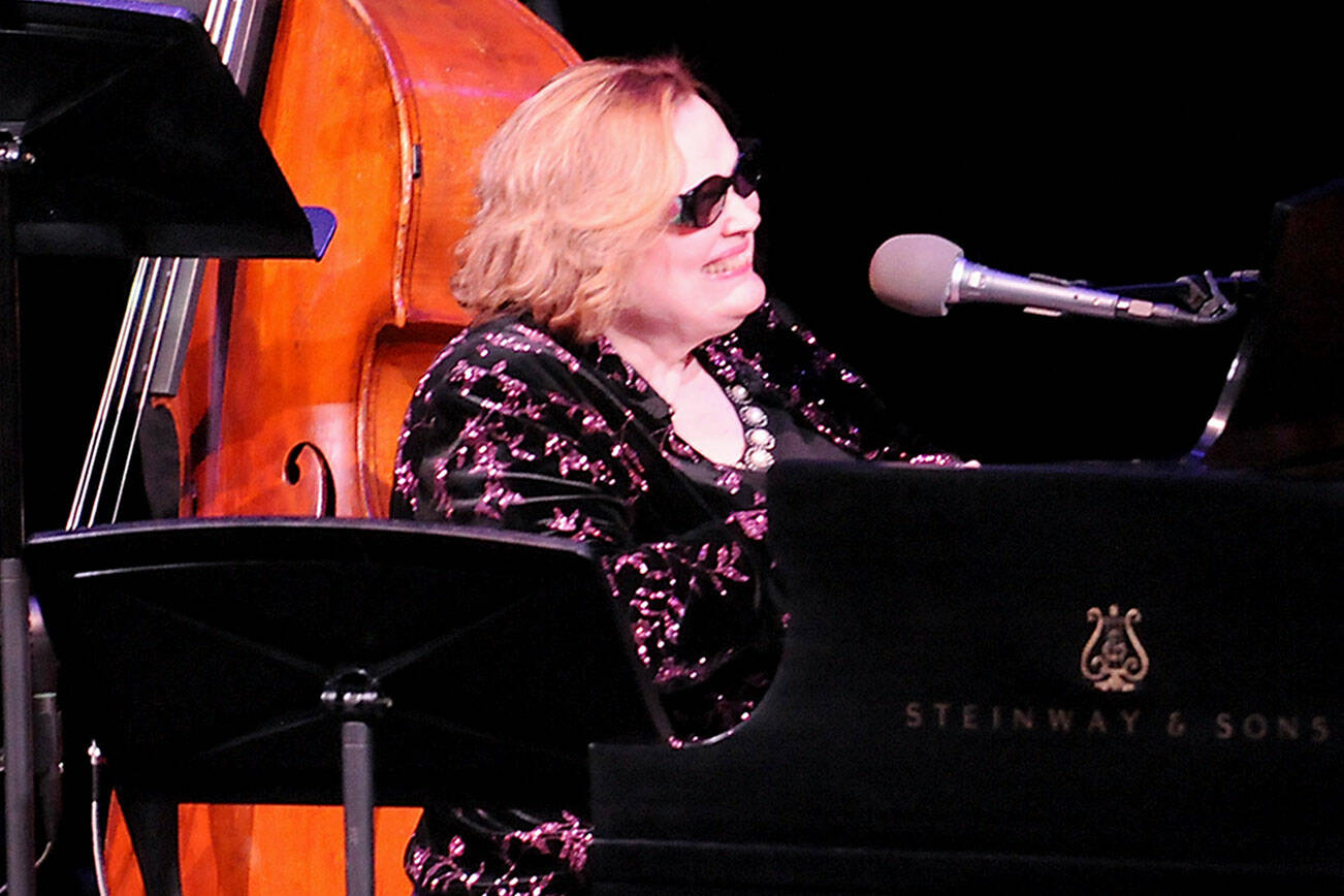 American jazz singer Diane “Deedles” Schuur, front, along with bassist Bruce Phares, perform in the Donna M. Morris Theater at the Field Arts & Events Hall in Port Angeles during Friday night’s opening weekend show. (Keith Thorpe/Peninsula Daily News)