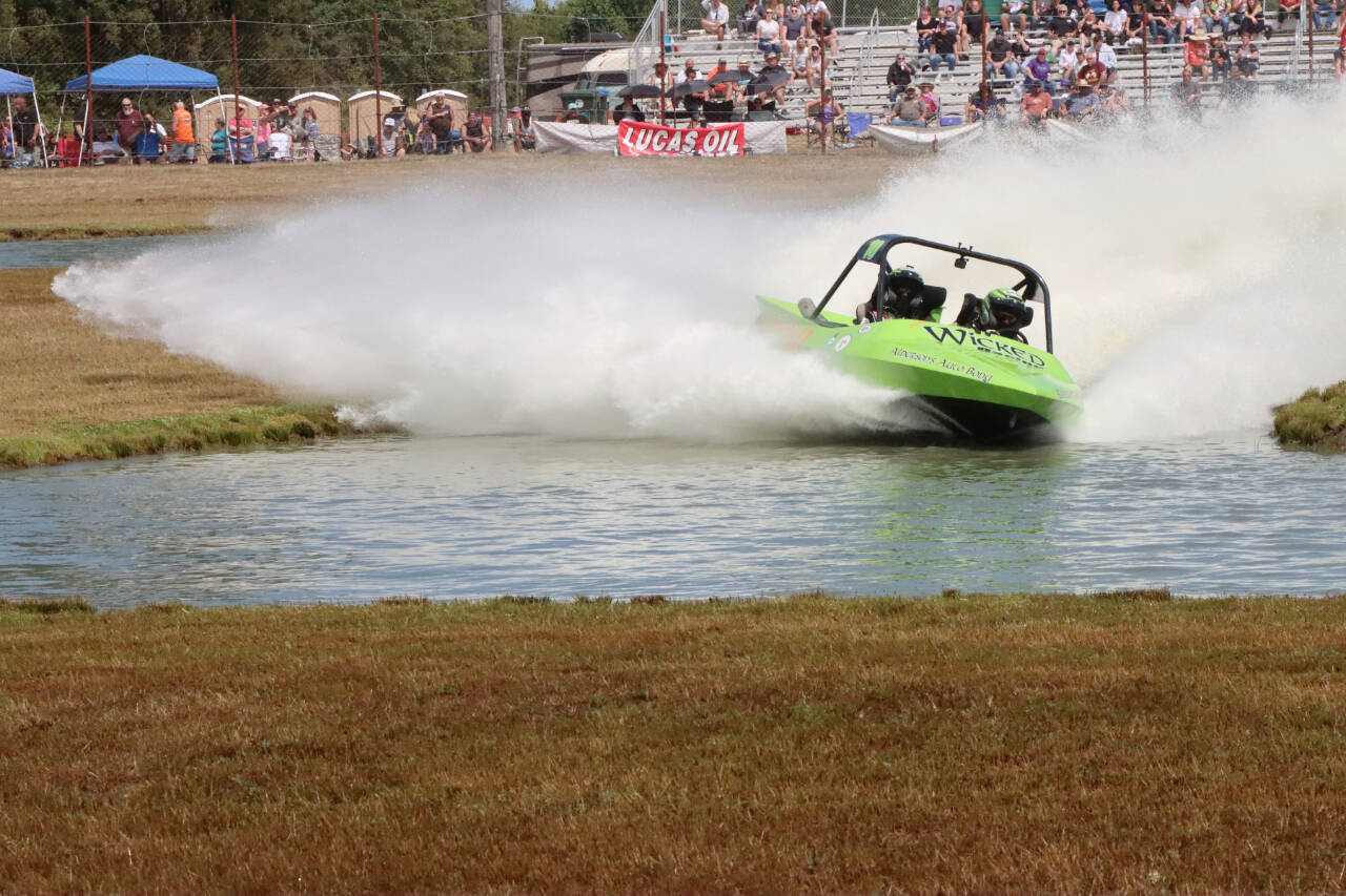 The Port Angeles-based Wicked Racing Team competes at the Extreme Sports Park on Sunday in the American Sprint Boat Racing finals in the unlimited class. The Wicked Racing boat, driven by Dan Morrison and navigated by Sami Gustufson, finished third. A total of 38 teams from the U.S., Canada and New Zealand competed at ESP this weekend. (Dave Logan/for Peninsula Daily News)