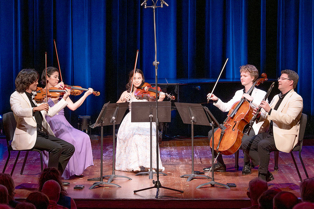 credit David Conklin. Left To Right: violinist Jason Moon, violinist Clara Neubauer, violist Laura Liu, cellist Carlo Lay, and clarinetist Alexander Fiterstein
