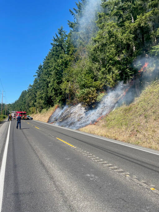 Residents in about six homes have been advised to evacuate as a growing brush fire burns along state Highway 19 near Chimacum. (Washington State Patrol)