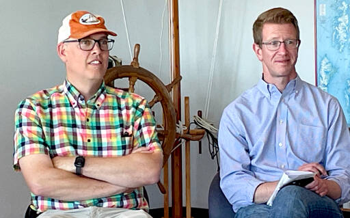 Eron Berg, Port of Port Townsend executive director, left, and U.S. Rep. Derek Kilmer listen to members of the marine trade industry. Kilmer is sponsoring a Community Project Funding request for $6.16 million to replace the port’s Boat Haven breakwater. (Paula Hunt/Peninsula Daily News)