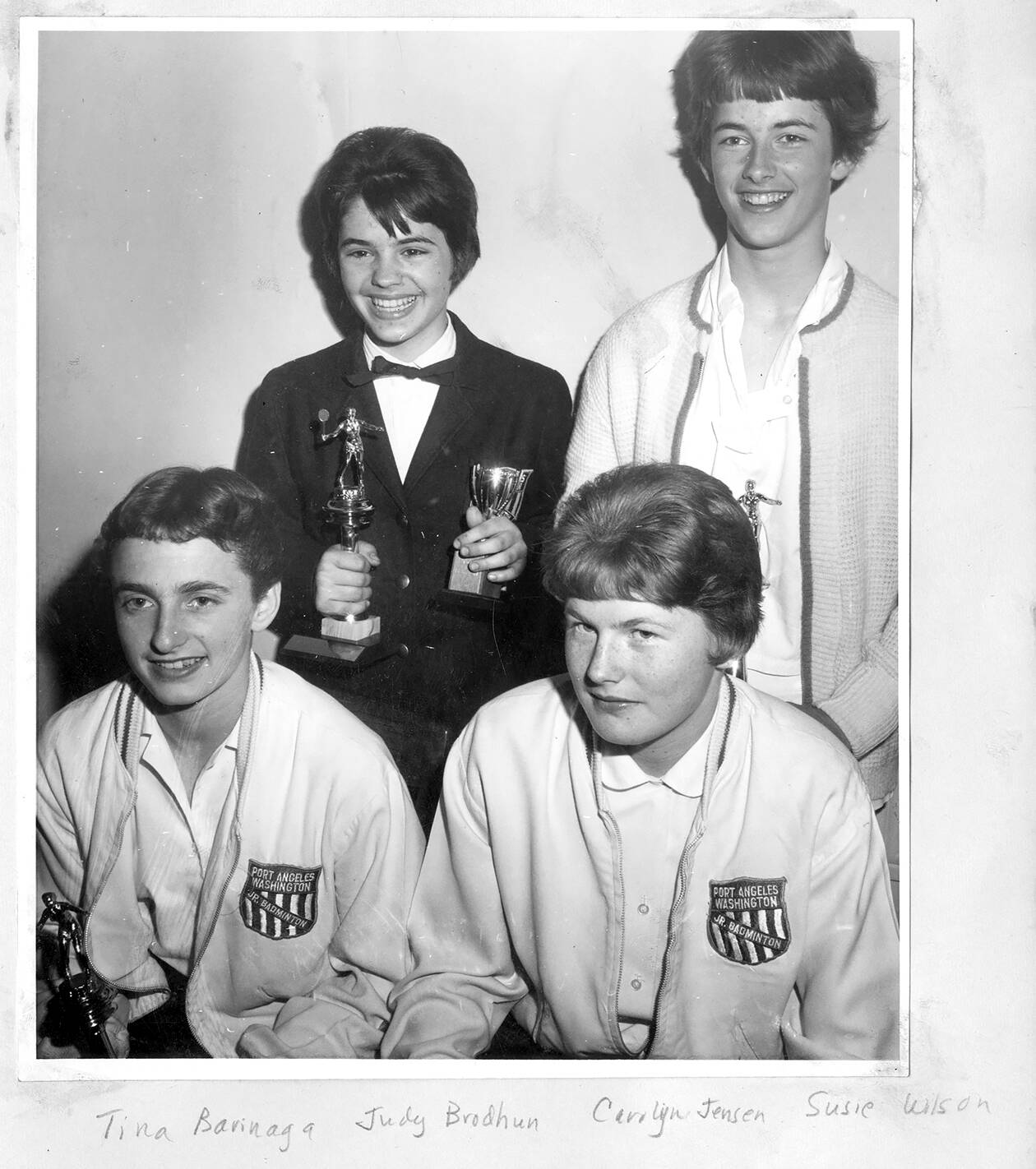 Members of the Port Angeles Junior Badminton team, from left, Tyna Barinaga, Caroline Jensen; back row, Judy Brodhun and Susie Childers were part of a squad that won an unprecedented 11 nationals titles as well as three second-place finishes in the 1964 Junior Nationals Tournament held in Pomona, Callif. Port Angeles players reached the finals 12 of 15 events.