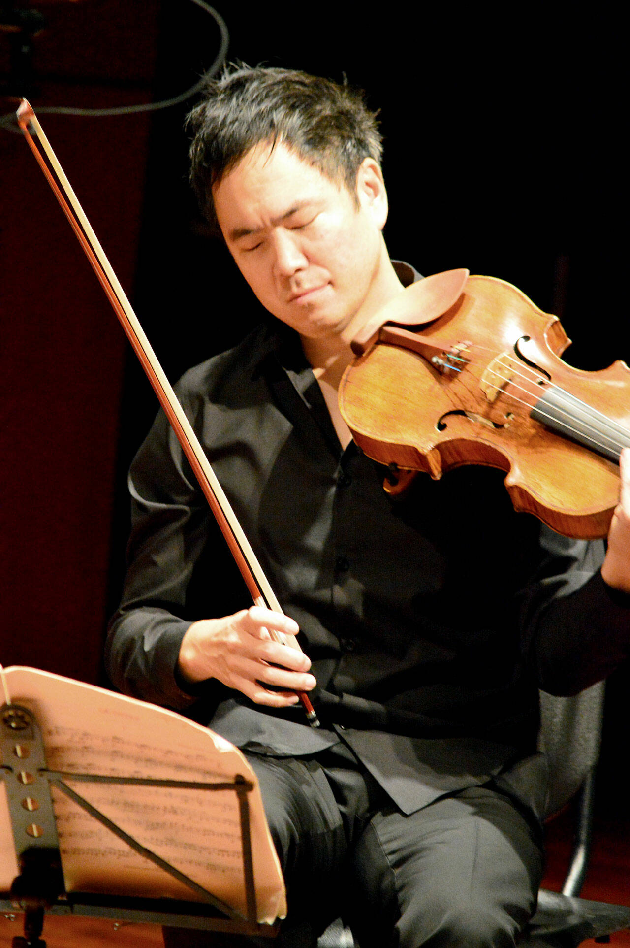 Grammy-winning violist Richard O’Neill, pictured rehearsing for a 2022 Music on the Strait performance, is back in Clallam County for the 2023 festival’s finale this weekend. (Diane Urbani de la Paz/for Peninsula Daily News)