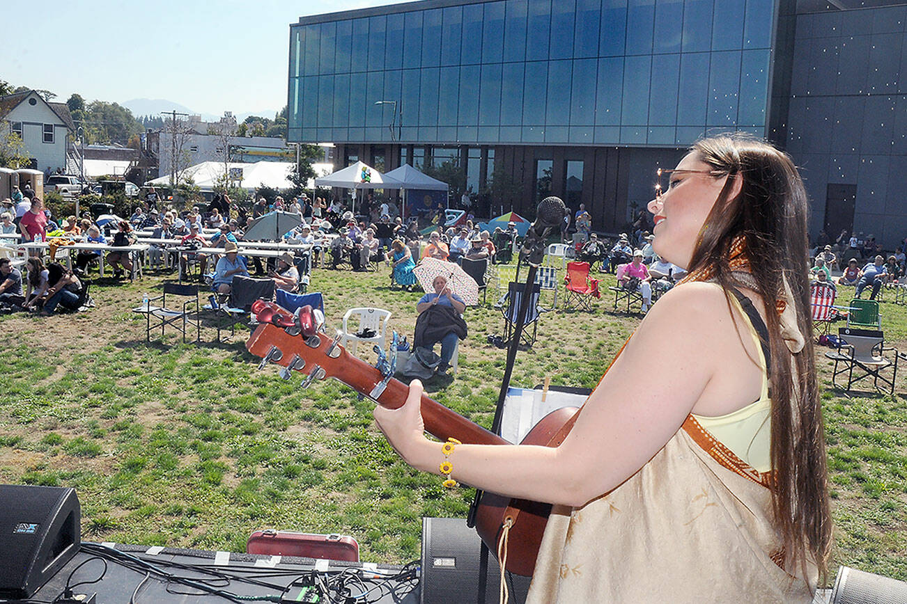 KEITH THORPE/PENINSULA DAILY NEWS
Jess Doenges of the Olympic Peninsula-based Bread and Gravy performs at Jammin' in the Park on Saturday at Pebble Beach Park in Port Angeles. The event, hosted by Nor'Wester Rotary and Koenig Subaru, featured an afternoon of music, food and childrens activities.